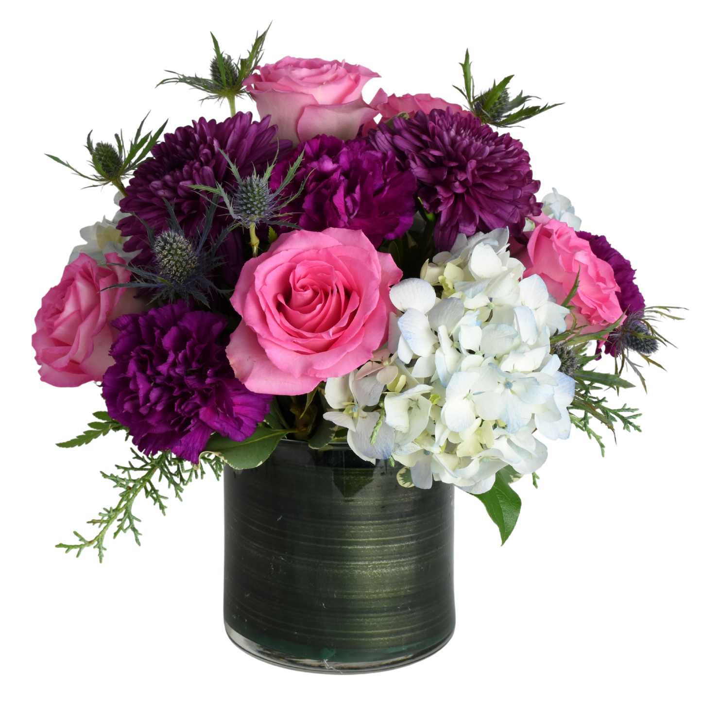 Jewel Queen Floral Arrangement where purple and plum flowers are accentuated with pink and touch of blue to create cheerful floral design.