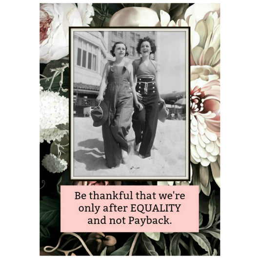 Vintage photo of two women in overalls with floral border and equality quote.