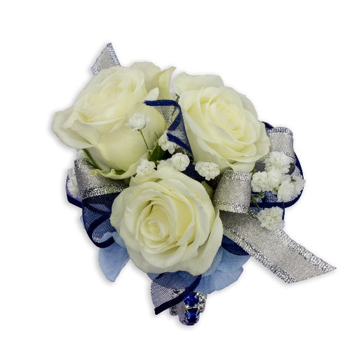 White rose corsage with blue and silver ribbons