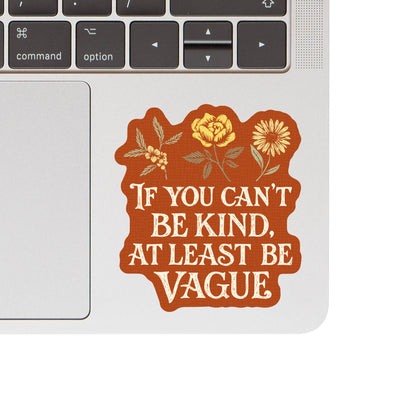 sticker that reads 'If you can't be kind, at least be vague' on a laptop