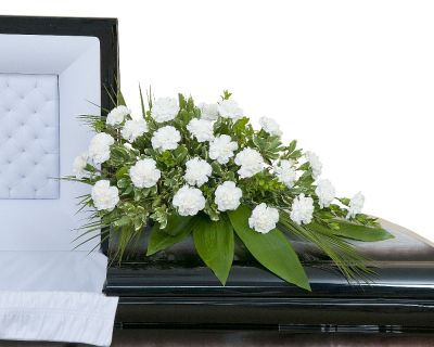 Carnations Casket Spray in Houston, TX