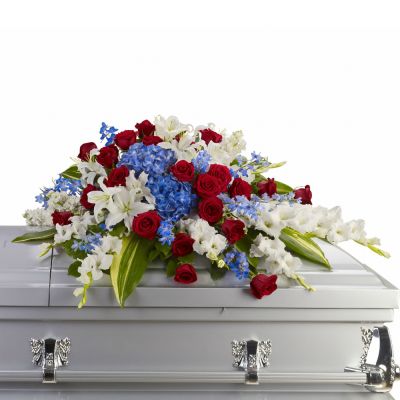 Red, white and blue, casket spray in Houston, TX