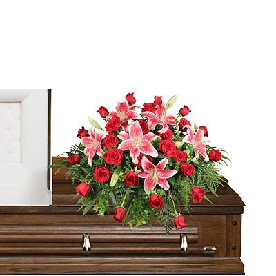 Stargazers and roses casket spray 